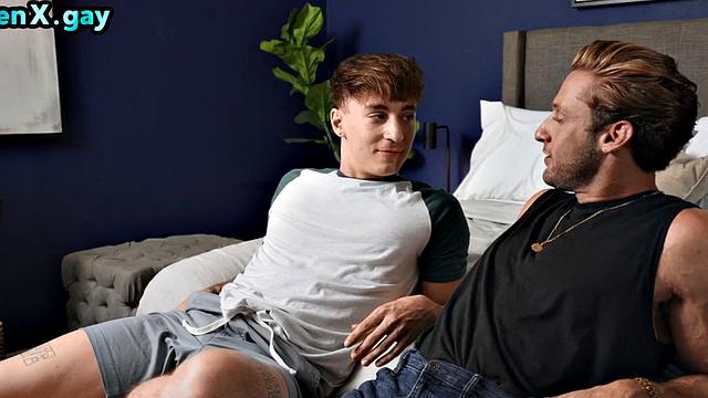 Inked jock wanks while fucked by his BF