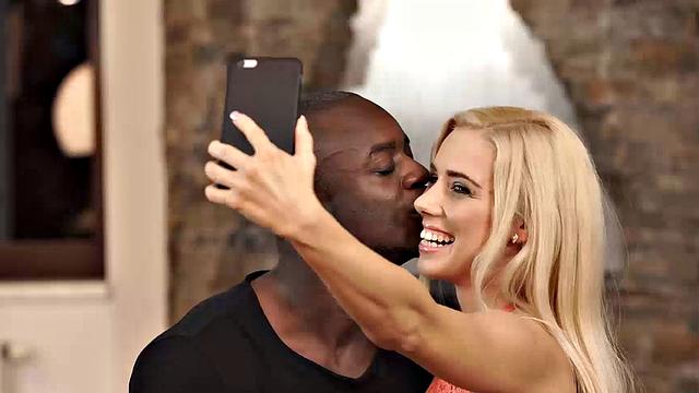 Blonde babe gets freaky with black BF's rod in selfies