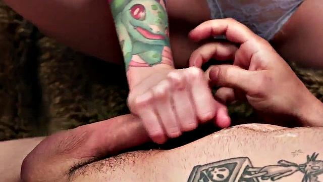 CFNM tattooed babe in high heels dominates & jerks dude's cock