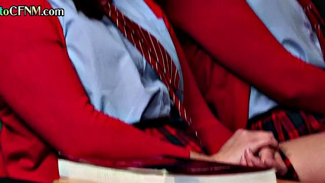 Uniform schoolbabes tugging guy