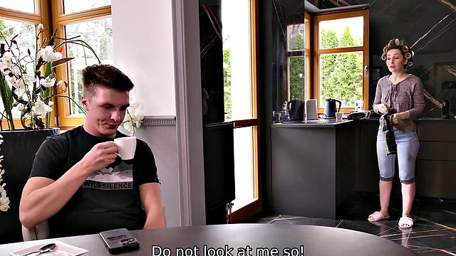 Blonde with high heels cheats on her man in the kitchen while wearing fishnet stockings and high heels