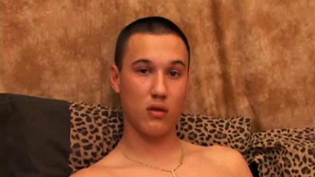 New to gay porn, 18 year old Arik is sweet, quiet and eager to please. With a video playing on the TV, Arik works his growing package, before stripping naked. His cock is already hard and he gets busy stroking it.