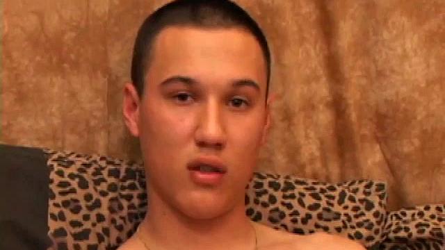 New to gay porn, 18 year old Arik is sweet, quiet and eager to please. With a video playing on the TV, Arik works his growing package, before stripping naked. His cock is already hard and he gets busy stroking it.