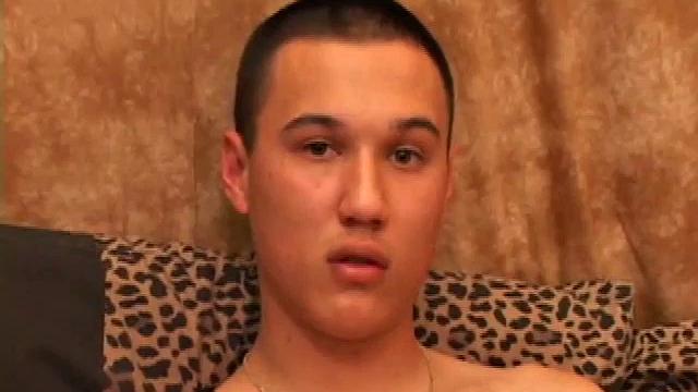 New to gay porn, 18 year old Arik is sweet, quiet and eager to please. With a video playing on the TV, Arik works his growing package, before stripping naked. His cock is already hard and he gets busy stroking it.