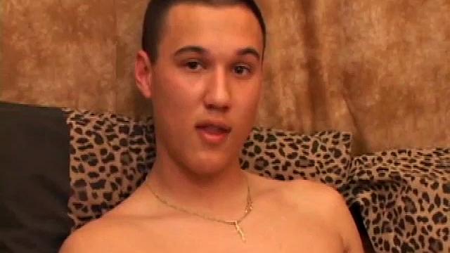 New to gay porn, 18 year old Arik is sweet, quiet and eager to please. With a video playing on the TV, Arik works his growing package, before stripping naked. His cock is already hard and he gets busy stroking it.