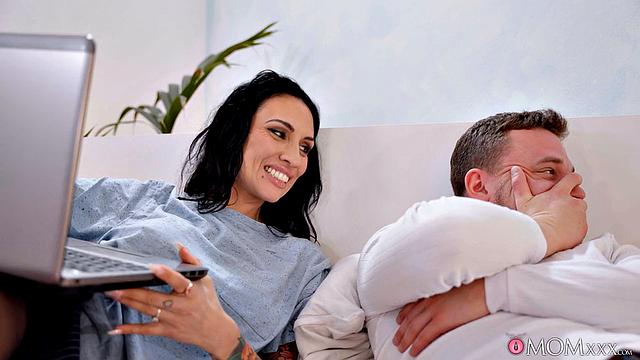 Sexy MILF with huge tits in a wet shirt