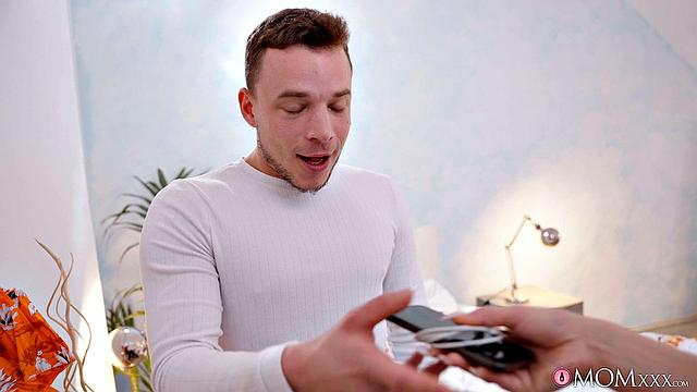 Sexy MILF with huge tits in a wet shirt