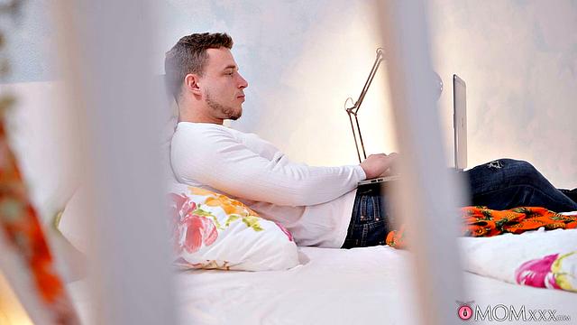 Sexy MILF with huge tits in a wet shirt