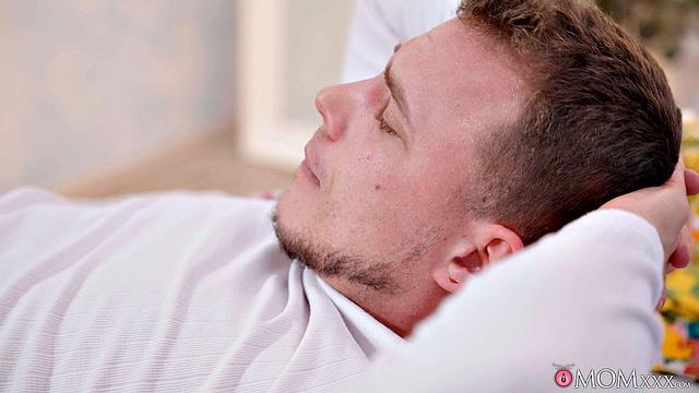 Sexy MILF with huge tits in a wet shirt