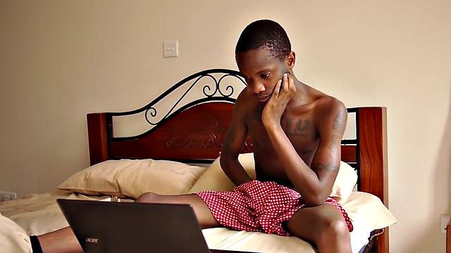 Tattoo African twink tugs his lubed during solo