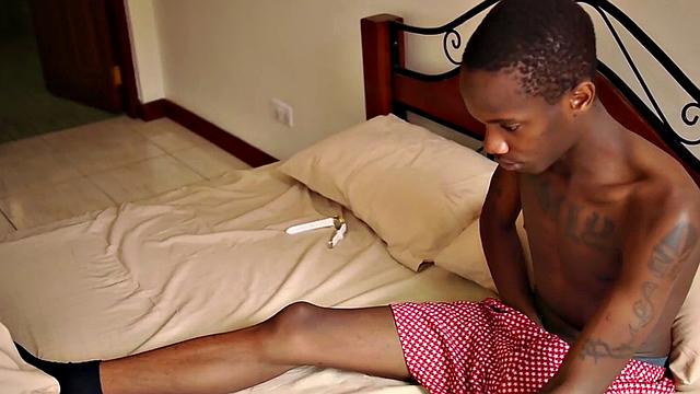 Tattoo African twink tugs his lubed during solo