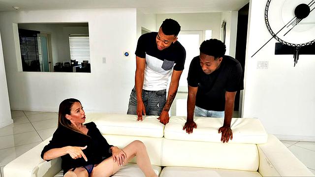 Busty MILF McKenzie on two big cocks