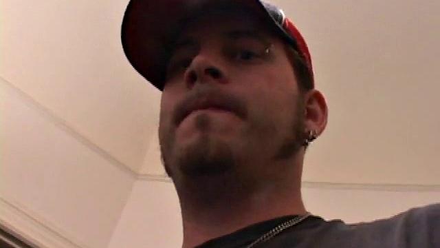 Pierced punk Elijah Mageddon goes to work on his cock. After stroking his stiff dick to the porn video, he pumps out his warm cum load onto the skateboard.