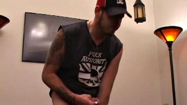 Pierced punk Elijah Mageddon goes to work on his cock. After stroking his stiff dick to the porn video, he pumps out his warm cum load onto the skateboard.