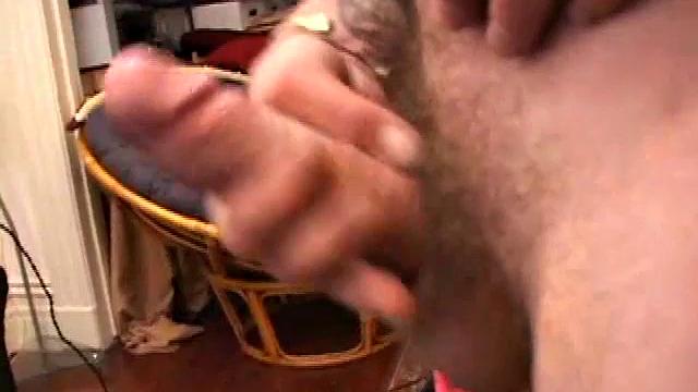 Pierced punk Elijah Mageddon goes to work on his cock. After stroking his stiff dick to the porn video, he pumps out his warm cum load onto the skateboard.