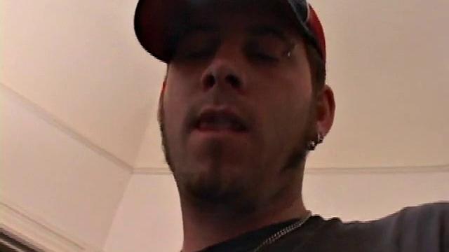 Pierced punk Elijah Mageddon goes to work on his cock. After stroking his stiff dick to the porn video, he pumps out his warm cum load onto the skateboard.