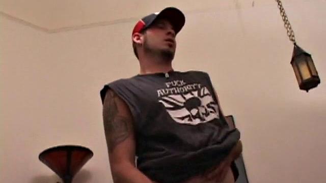 Pierced punk Elijah Mageddon goes to work on his cock. After stroking his stiff dick to the porn video, he pumps out his warm cum load onto the skateboard.