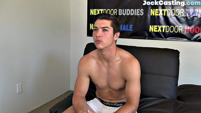 Athletic jock masturbates solo on couch during casting audition