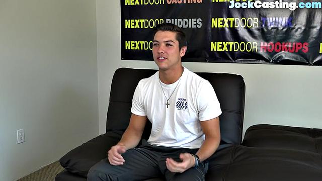 Athletic jock masturbates solo on couch during casting audition