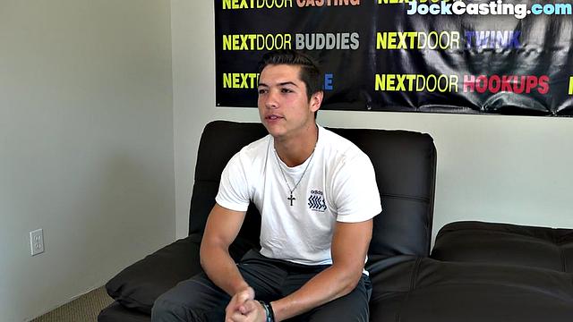 Athletic jock masturbates solo on couch during casting audition