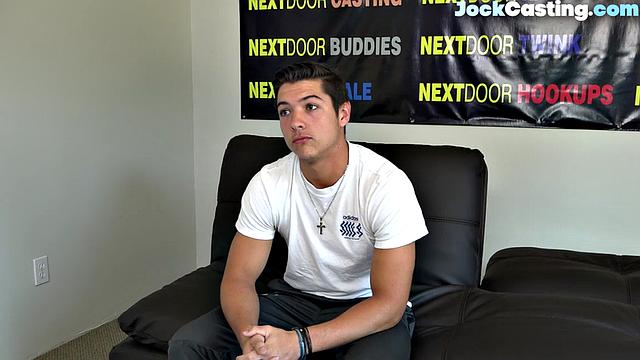 Athletic jock masturbates solo on couch during casting audition