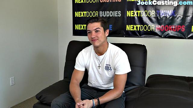 Athletic jock masturbates solo on couch during casting audition