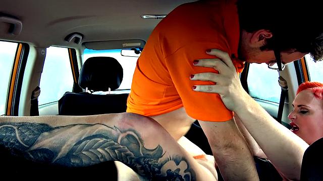 Redhead tattooed slut craves a massive cock for her wild work fantasies