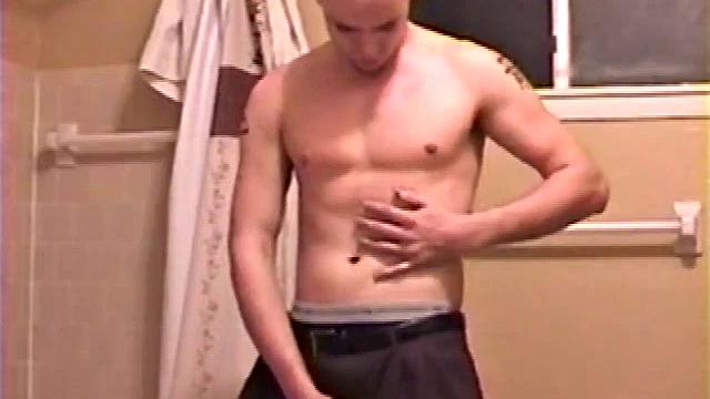 After a busy day Shawn's in the bathroom getting ready to shower and decides to play with himself through his pants. He strips and flexes for the camera, while stroking his hard dick and soon Shawn blasts a warm cum load onto his chest.