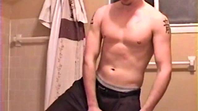 After a busy day Shawn's in the bathroom getting ready to shower and decides to play with himself through his pants. He strips and flexes for the camera, while stroking his hard dick and soon Shawn blasts a warm cum load onto his chest.