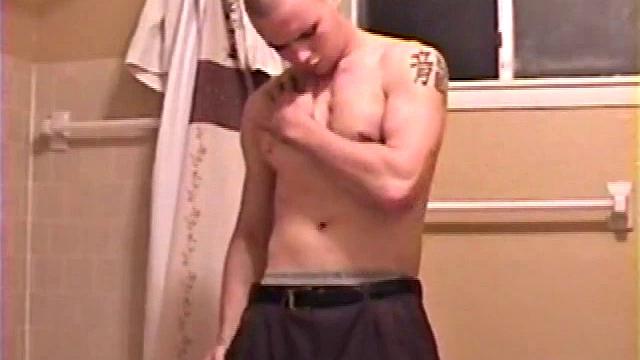 After a busy day Shawn's in the bathroom getting ready to shower and decides to play with himself through his pants. He strips and flexes for the camera, while stroking his hard dick and soon Shawn blasts a warm cum load onto his chest.