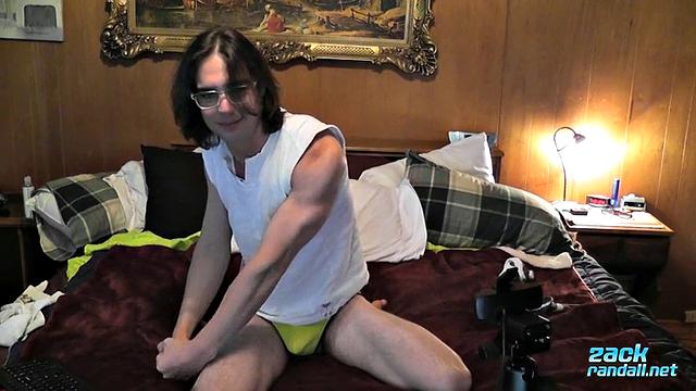 Zack Randall strokes his thick cock and shoots a heavy load for the camera