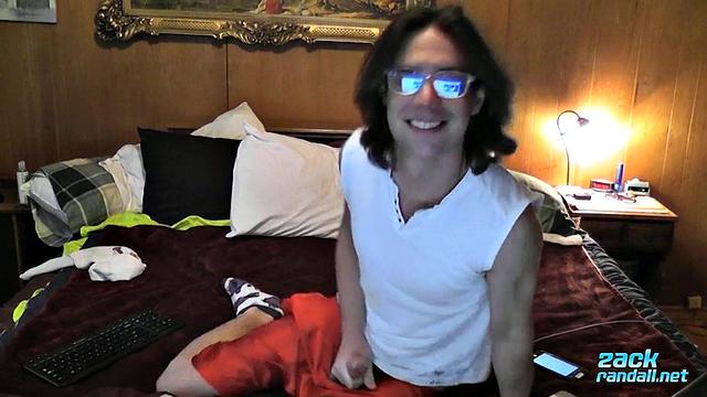Zack Randall strokes his thick cock and shoots a heavy load for the camera