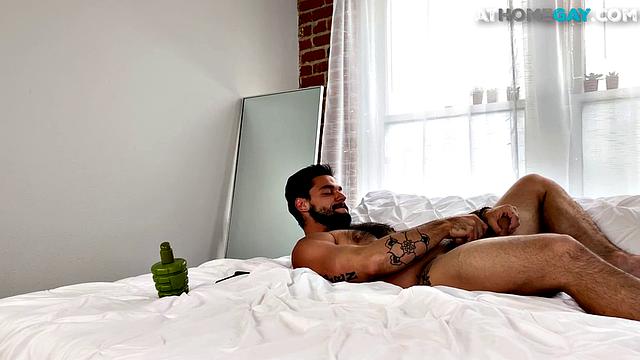 Inked cub toys ass and milks shaft during solo action