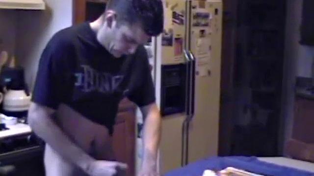 Getting ready to stroke one out, straight boy Ric grabs some lube, a towel and a porn magazine. After he pulls his hard cock out and looks at the naked girl pics a helping hand reaches in to give him an assist.