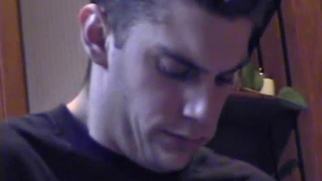 Getting ready to stroke one out, straight boy Ric grabs some lube, a towel and a porn magazine. After he pulls his hard cock out and looks at the naked girl pics a helping hand reaches in to give him an assist.