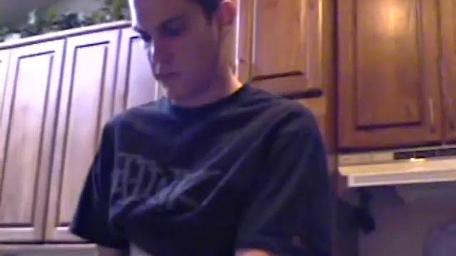 Getting ready to stroke one out, straight boy Ric grabs some lube, a towel and a porn magazine. After he pulls his hard cock out and looks at the naked girl pics a helping hand reaches in to give him an assist.