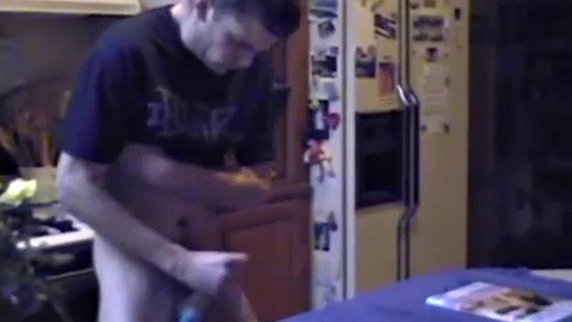 Getting ready to stroke one out, straight boy Ric grabs some lube, a towel and a porn magazine. After he pulls his hard cock out and looks at the naked girl pics a helping hand reaches in to give him an assist.