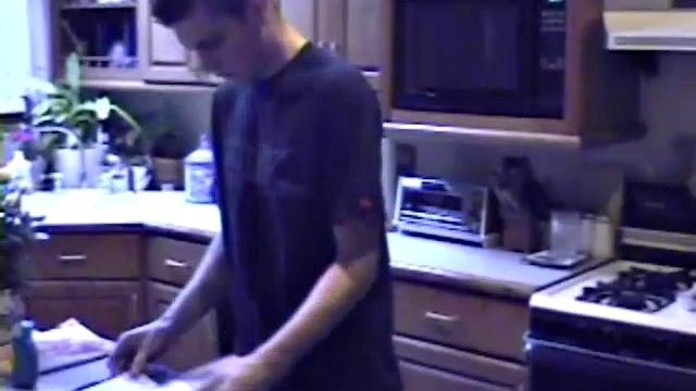 Getting ready to stroke one out, straight boy Ric grabs some lube, a towel and a porn magazine. After he pulls his hard cock out and looks at the naked girl pics a helping hand reaches in to give him an assist.