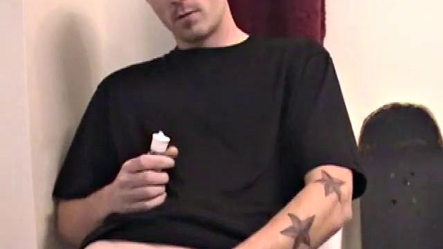 Dan strokes his hard cock and can't hold back