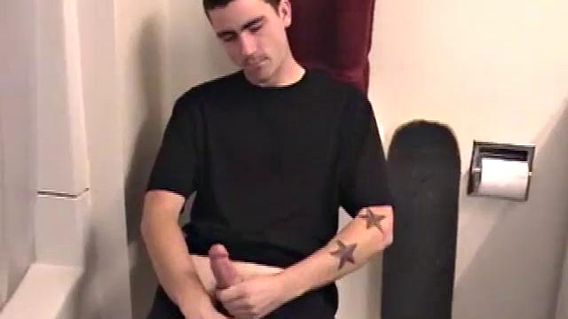 Dan strokes his hard cock and can't hold back