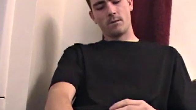 Dan strokes his hard cock and can't hold back