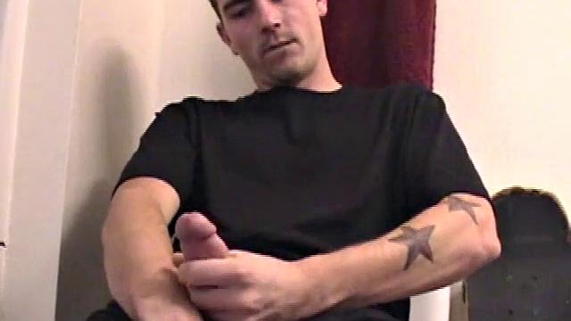Dan strokes his hard cock and can't hold back