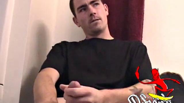 Dan strokes his hard cock and can't hold back