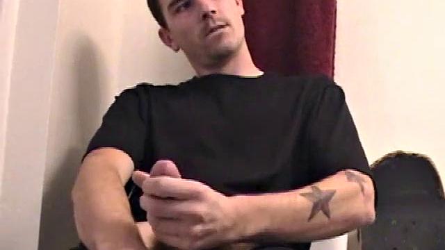 Dan strokes his hard cock and can't hold back
