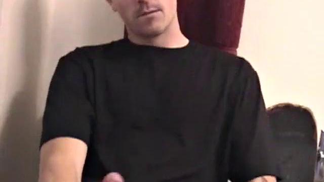 Dan strokes his hard cock and can't hold back