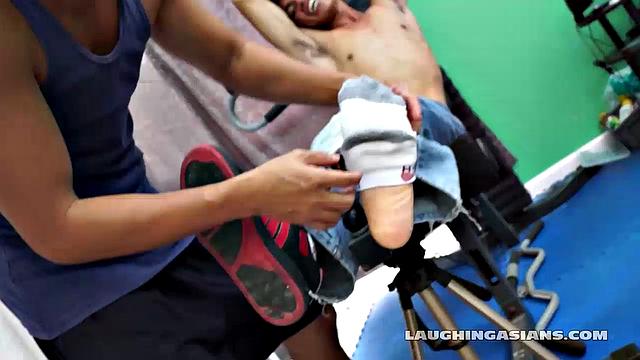 If you love male foot tickling, you're going to love this one! Cute Asian Boy Argie Comes by for a Gym Workout with His Trainer. The Gym Trainer Secures Argie for Vigorous Leg Workout.