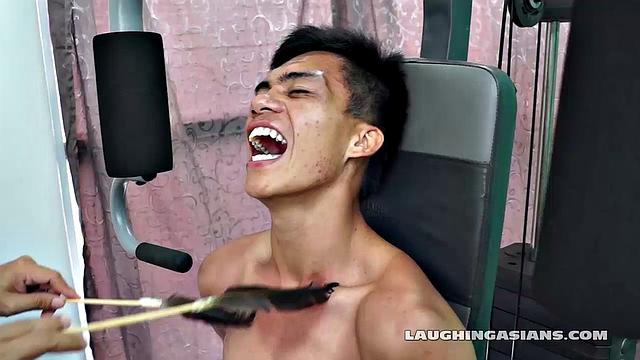 If you love male foot tickling, you're going to love this one! Cute Asian Boy Argie Comes by for a Gym Workout with His Trainer. The Gym Trainer Secures Argie for Vigorous Leg Workout.