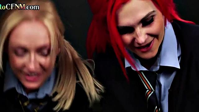 Uniform schoolbabes tugging classmates