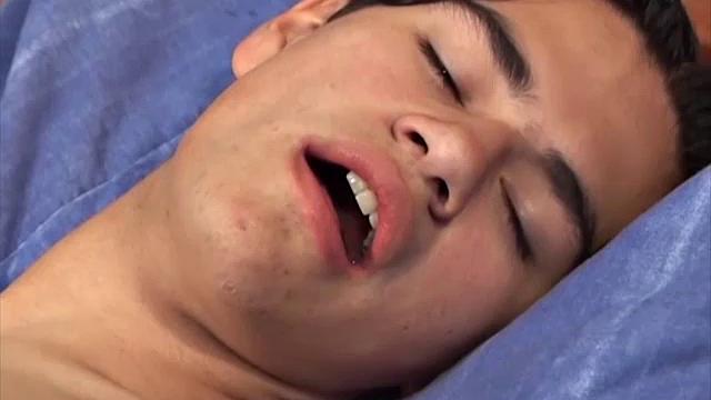 Latin twink Cesar peels off his clothes on the bed, revealing his big uncut cock to pleasure himself. Naked, Cesar has a nice boner. To warm up, he gives his smooth ass a long finger fucking.