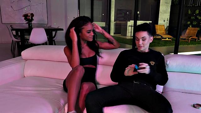 Strapon inked queer fucks Ebony pussy, then gets licked.